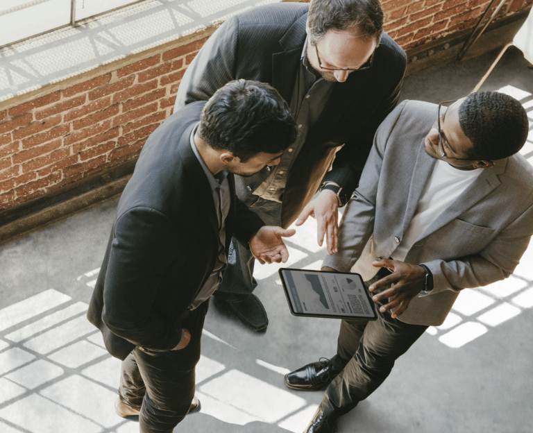 Employees Reviewing Data